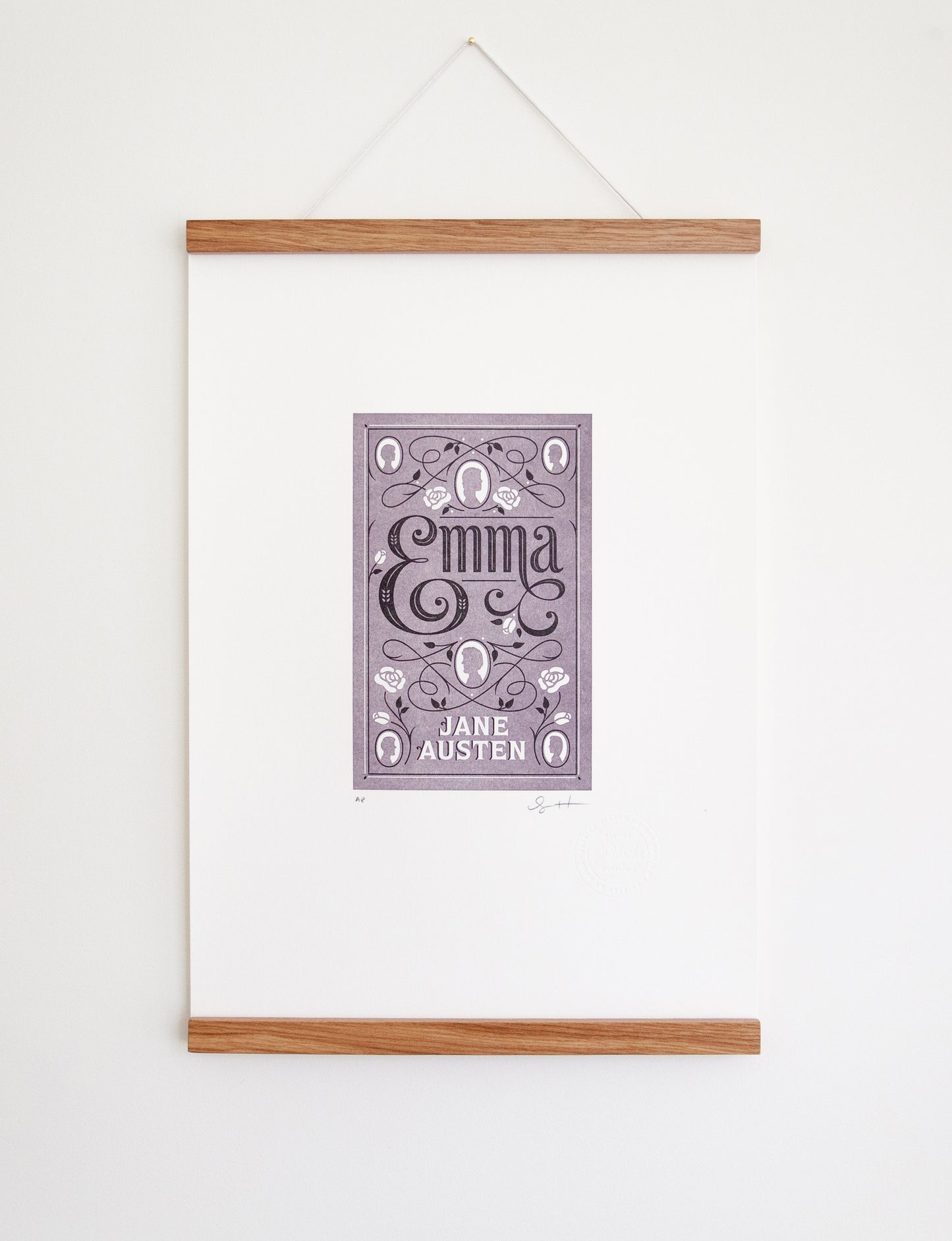 Framed 2-color letterpress print in violet and black. Printed artwork is an illustrated book cover of Emma including custom hand lettering.