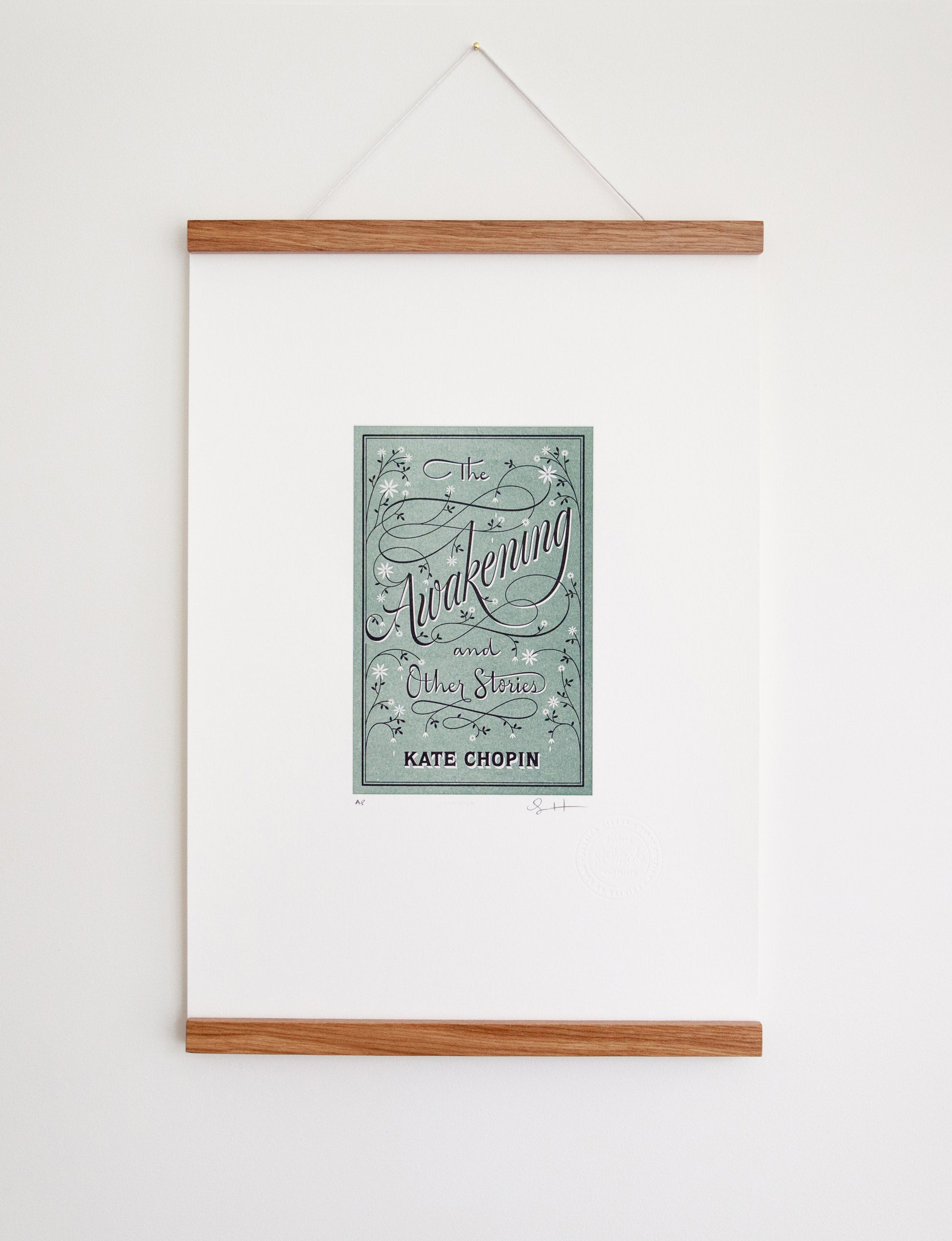 Framed 2-color letterpress print in green and black. Printed artwork is an illustrated book cover of The Adventures of The Awakening including custom hand lettering.