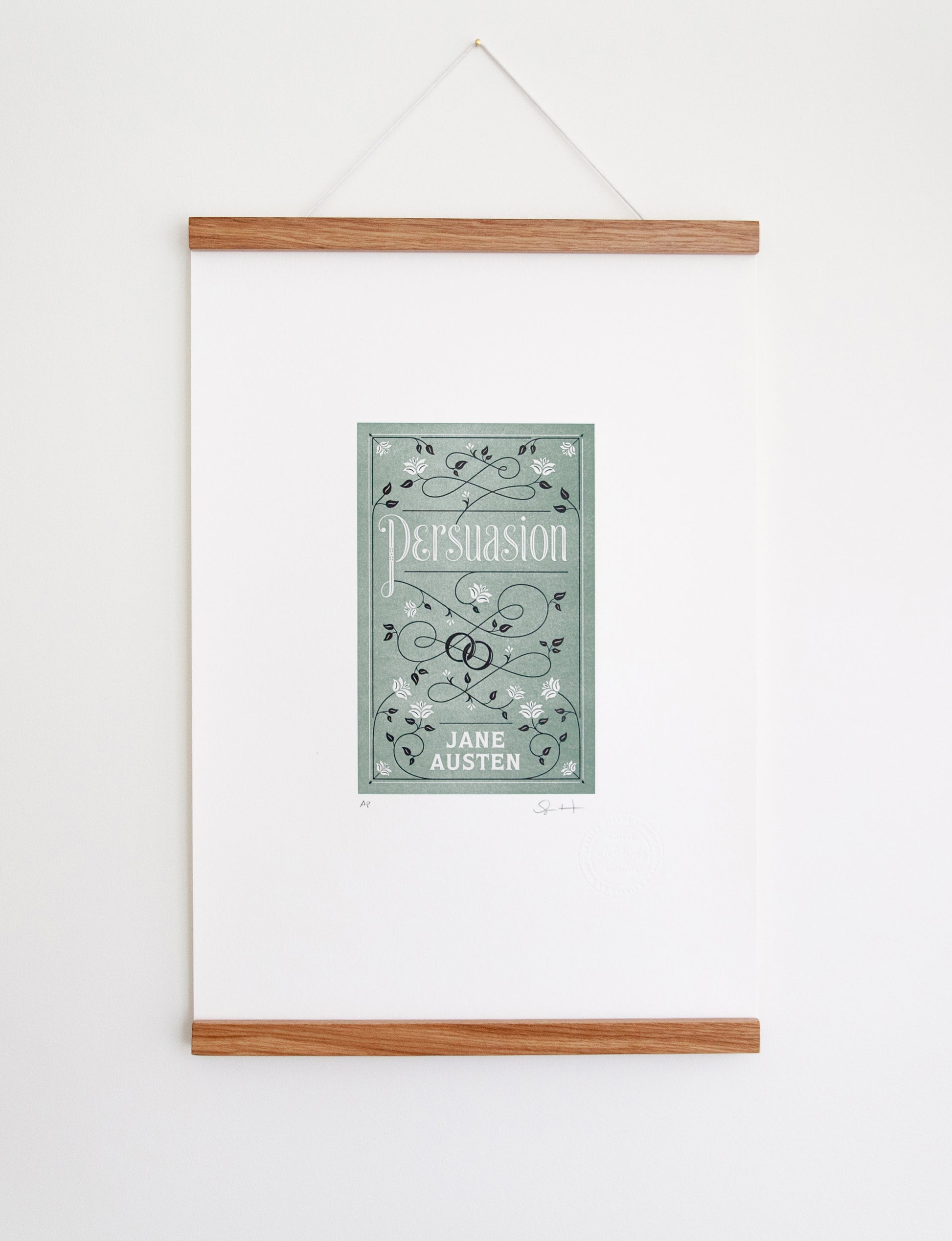 Framed 2-color letterpress print in green and black. Printed artwork is an illustrated book cover of Persuasion including custom hand lettering.